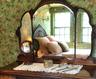 Bedroom featuring wallpapered walls