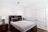 Bedroom with dark wood-type flooring, a closet, and recessed lighting