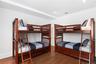 Bedroom featuring dark wood-style flooring and recessed lighting