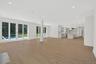 Unfurnished living room featuring recessed lighting and light wood-type flooring