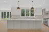 Kitchen featuring hanging light fixtures, a kitchen island, glass insert cabinets, gas stove, and recessed lighting