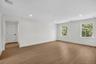 Spare room with light wood-style flooring and recessed lighting