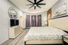 Bedroom with baseboards and wood finished floors