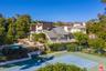 Tennis court, pool with park l