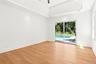 Unfurnished room with ceiling fan, light wood finished floors, a raised ceiling, and recessed lighting