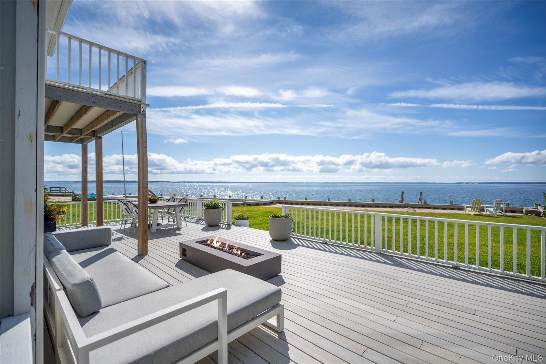 Expansive deck ideal for al fresco dining, gatherings and waterfront entertaining.