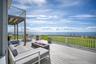 Expansive deck ideal for al fresco dining, gatherings and waterfront entertaining.