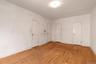 Unfurnished room featuring light wood-style flooring and baseboards