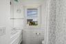 Well appointed full bathroom with modern fixtures and finishes.