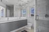 Luxurious full bathroom with clean finishes and contemporary design.