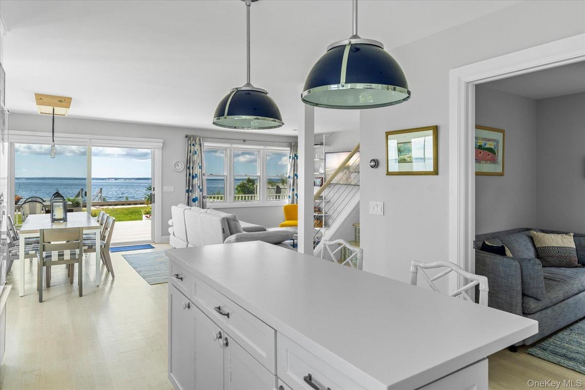 Spacious island with breakfast bar seating, ideal for casual dining and entertaining.