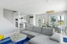 Open and airy living space designed to maximize waterfront scenery.