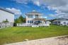 Exquisite architecture with recent upgrades including new roof, siding, driveway and gutters.
