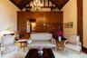Living area featuring high vaulted ceiling, a wood ceiling with exposed beams, and a chandelier