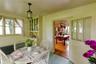 Dining room featuring radiator heating unit and wood finished floors