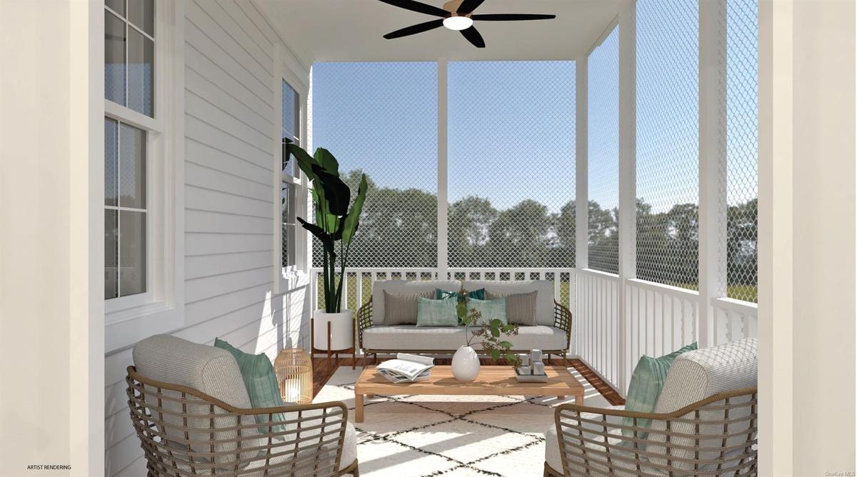 Sunroom / solarium featuring ceiling fan