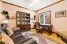 Office area with light wood-style flooring, crown molding, and recessed lighting