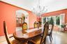 Dining area featuring arched walkways, a chandelier, ornamental molding, recessed lighting, and light tile patterned flooring