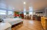 Guest quarters/In-Law Suite/Bedroom with light wood-type flooring, a sink, and recessed lighting