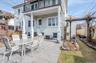 View of Rear patio/terrace with access to gardens, Garden level/basement, upper kitchen patio. Fully fenced with outdoor dining space