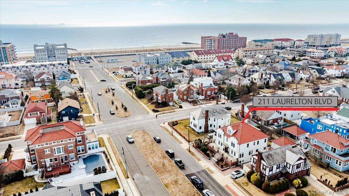 Aerial view featuring an ocean view. Home is 2 blocks to Boardwalk