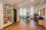 Bedroom with baseboards, wood finished floors, and recessed lighting