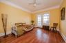 2nd Floor, Rear Bedroom featuring a ceiling fan, terrace access