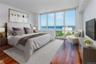 Bedroom featuring dark wood-type flooring