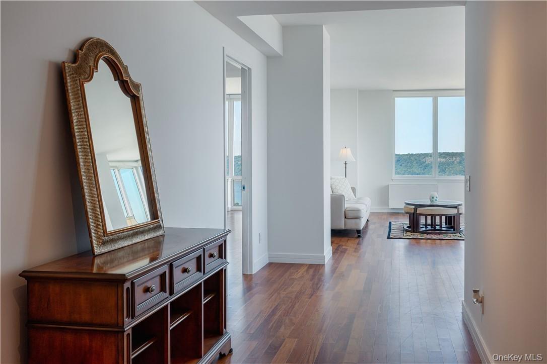 Hallway featuring dark hardwood / wood-style floors