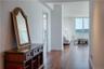 Hallway featuring dark hardwood / wood-style floors