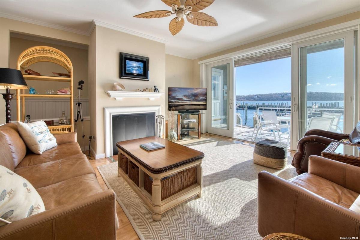 Waterside living room with fireplace