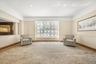 Sitting room featuring baseboards and recessed lighting
