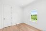 Spare room with crown molding, light wood finished floors, and recessed lighting