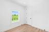 Unfurnished room featuring light wood-style floors, crown molding, and recessed lighting