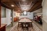 Dining room with wood ceiling and recessed lighting