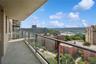 Balcony with a city view and a water view