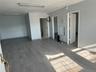 Unfurnished bedroom featuring wood finished floors and baseboards