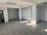 Below grade area featuring wood finished floors and baseboards
