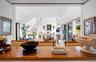 Living room with high vaulted ceiling