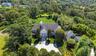 View from above of property featuring a forest