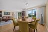 Dining room featuring crown molding and hardwood / wood-style floors