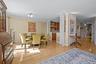 Dining area featuring crown molding and light wood-style floors