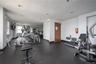 Workout area featuring baseboards and recessed lighting