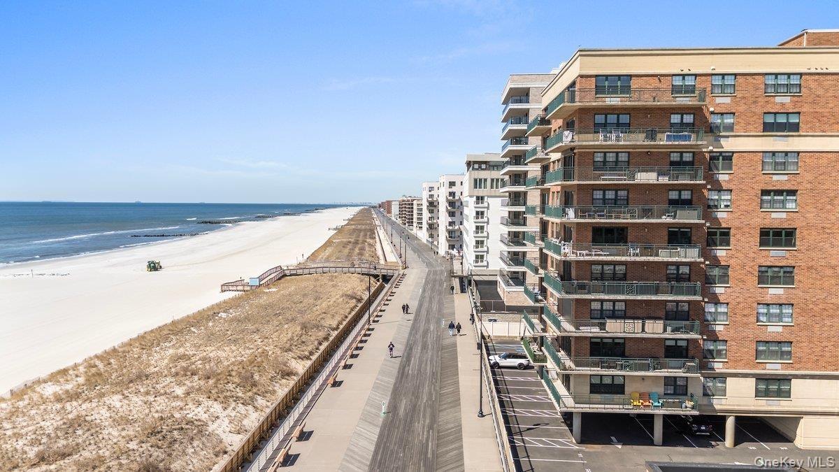 Property view of water with a view of the beach