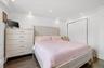 Bedroom featuring recessed lighting, dark wood-style floors, and crown molding