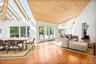 Interior featuring a skylight, high vaulted celings