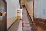 Staircase featuring ornamental molding
