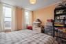 Bedroom featuring multiple windows