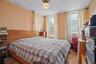 Bedroom with wood finished floors