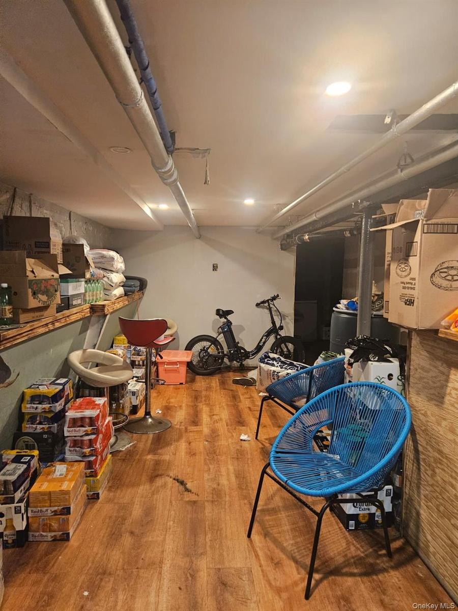 Unfinished basement with wood finished floors
